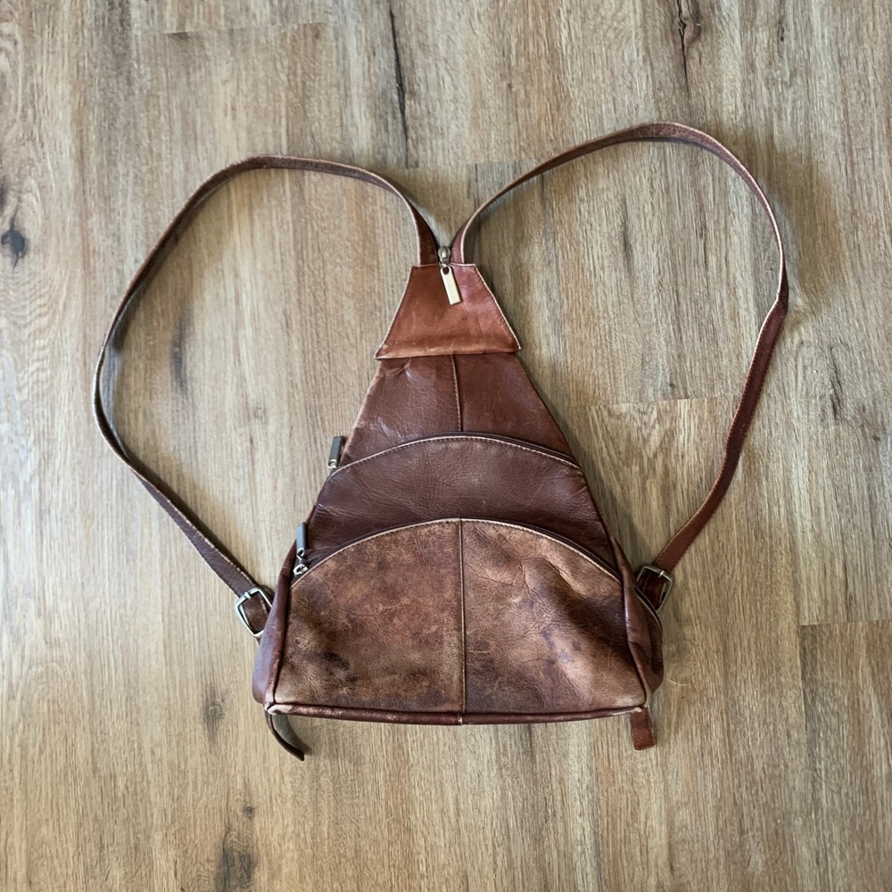 Vintage 90s brown leather triangle backpack w/ zippable strap, 3+ pockets
